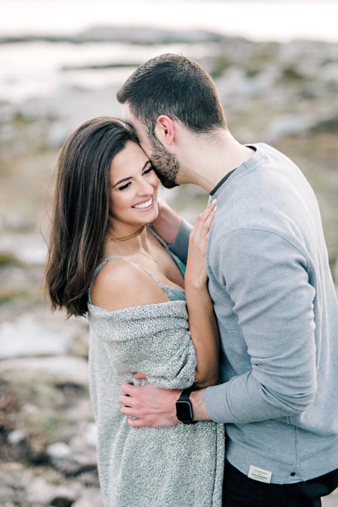 guy kissing girlfriends cheek